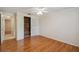 Well-lit bedroom with wood floors and a large closet at 4244 Tamargo Dr, New Port Richey, FL 34652