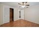 Spacious bedroom with wood flooring and built-in closet at 4244 Tamargo Dr, New Port Richey, FL 34652