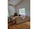 Living room with wood floors and sliding glass door at 2367 N Bentley Dr, Palm Harbor, FL 34684