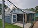 Gray shed with white trim at 2367 N Bentley Dr, Palm Harbor, FL 34684