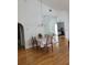 Dining room with table and chairs, wood floors at 2367 N Bentley Dr, Palm Harbor, FL 34684