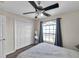 Well-lit bedroom featuring a comfortable bed, closet and ample natural light from the window at 4557 35Th Avenue E Cir, Palmetto, FL 34221