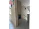 Indoor stairwell with trash chute and exit sign at 1245 S Martin Luther King Jr Ave # 304, Clearwater, FL 33756