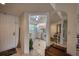 Inviting entryway offering a view into the kitchen and living area at 1245 S Martin Luther King Jr Ave # 304, Clearwater, FL 33756