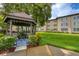 Charming gazebo with seating in a manicured lawn at 1245 S Martin Luther King Jr Ave # 304, Clearwater, FL 33756