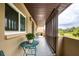 Private balcony with small table and chairs at 1245 S Martin Luther King Jr Ave # 304, Clearwater, FL 33756