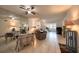 Bright dining area with a table set for two, adjacent to the living room at 1245 S Martin Luther King Jr Ave # 304, Clearwater, FL 33756