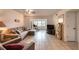 Spacious living room featuring a sectional sofa and ample natural light at 1245 S Martin Luther King Jr Ave # 304, Clearwater, FL 33756
