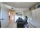 Home office with a desk, chair, and built-in shelving at 1245 S Martin Luther King Jr Ave # 304, Clearwater, FL 33756