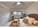 Main bedroom with ceiling fan, large closet and window at 1245 S Martin Luther King Jr Ave # 304, Clearwater, FL 33756