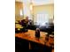Kitchen with granite countertops and breakfast bar at 701 S Madison Ave # 106, Clearwater, FL 33756