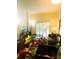 Living room with access to patio or balcony at 701 S Madison Ave # 106, Clearwater, FL 33756
