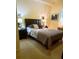 Spacious main bedroom with plush bedding and nightstands at 701 S Madison Ave # 106, Clearwater, FL 33756