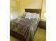 Charming bedroom with neutral decor and ample closet space at 701 S Madison Ave # 106, Clearwater, FL 33756