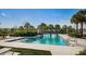 Resort-style community pool with lounge chairs at 12610 Rangeland Blvd, Odessa, FL 33556