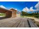 Wooden pavilion with deck overlooking lake at 12610 Rangeland Blvd, Odessa, FL 33556