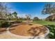 Circular playground with spinning play equipment at 12610 Rangeland Blvd, Odessa, FL 33556