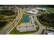 Aerial view of community tennis courts with parking at 12610 Rangeland Blvd, Odessa, FL 33556