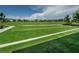 Expansive green lawn with sidewalks and a pavilion at 12610 Rangeland Blvd, Odessa, FL 33556