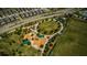 Aerial view of community playground with play structures at 12610 Rangeland Blvd, Odessa, FL 33556