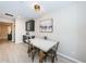 Bright breakfast nook with a farmhouse style table at 12610 Rangeland Blvd, Odessa, FL 33556
