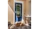 Inviting entryway with a navy blue door and a welcoming mat at 12610 Rangeland Blvd, Odessa, FL 33556