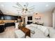 Spacious living room with a comfortable sectional sofa and large TV at 12610 Rangeland Blvd, Odessa, FL 33556