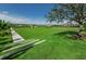Steps leading to a spacious green lawn area at 12610 Rangeland Blvd, Odessa, FL 33556