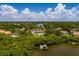 Waterfront property with a private dock and a large home with a pool at 7400 14Th Ne St, St Petersburg, FL 33702