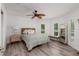 Comfortable bedroom with a queen-size bed and access to a private bathroom at 7400 14Th Ne St, St Petersburg, FL 33702