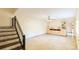 Spacious living room with tile floors and built-in shelving at 707 1St Ct, Palm Harbor, FL 34684