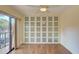 Spacious bedroom closet with built-in shelving and mirrored doors at 707 1St Ct, Palm Harbor, FL 34684