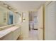 Clean bathroom with double vanity and shower at 707 1St Ct, Palm Harbor, FL 34684