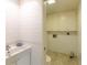Clean bathroom with single sink and laundry area at 707 1St Ct, Palm Harbor, FL 34684