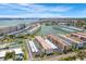Scenic aerial view of a condo complex with a waterfront setting, surrounded by lush landscaping at 3128 59Th S St # 214, Gulfport, FL 33707