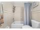 Functional bathroom features a bathtub-shower, neutral tiling, and essential fixtures for convenience at 3128 59Th S St # 214, Gulfport, FL 33707
