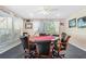 Inviting game room with a poker table and comfortable rolling chairs, perfect for entertaining Gathering and friends at 3128 59Th S St # 214, Gulfport, FL 33707