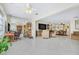 Expansive living area featuring an open layout, tile flooring, and ample natural light from the adjacent bonus room at 3128 59Th S St # 214, Gulfport, FL 33707