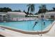 Inviting community pool with ample space for swimming and relaxing at 9580 45Th N Way, Pinellas Park, FL 33782