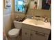 Clean bathroom with a toilet, sink, and vanity at 14000 104Th Ave, Largo, FL 33774