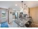 Modern kitchen with stainless steel appliances and granite countertops at 175 116Th Ave # 102, Treasure Island, FL 33706