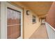 Building hallway leading to unit 102 at 175 116Th Ave # 102, Treasure Island, FL 33706