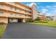 Two-story building with parking and landscaping at 175 116Th Ave # 102, Treasure Island, FL 33706