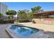Clean hot tub with surrounding seating at 7050 Sunset S Dr # 203, South Pasadena, FL 33707