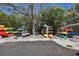 Community kayak storage with many kayaks at 7050 Sunset S Dr # 203, South Pasadena, FL 33707
