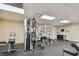 Fitness center with various weight and cardio machines at 7050 Sunset S Dr # 203, South Pasadena, FL 33707