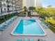 Relaxing pool area with ample seating at 7050 Sunset S Dr # 203, South Pasadena, FL 33707