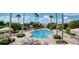 Resort-style pool with ample deck space and lush landscaping at 1180 Gulf Blvd # 504, Clearwater Beach, FL 33767