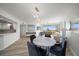 Bright dining area with marble table and ocean view at 1180 Gulf Blvd # 504, Clearwater Beach, FL 33767