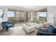 Living room with ocean view and comfortable seating at 1180 Gulf Blvd # 504, Clearwater Beach, FL 33767